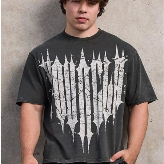 Active Comfort Tee™ worn by a young man standing against a concrete wall, showcasing its stylish and comfortable design.